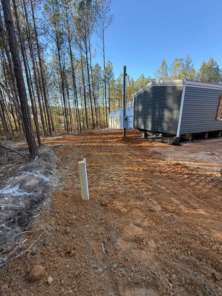 Cleared site with utilities and buildings