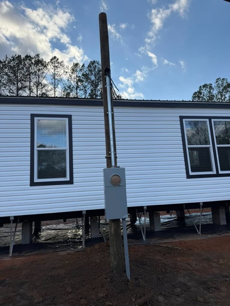 Electrical meter pole and conduit installation